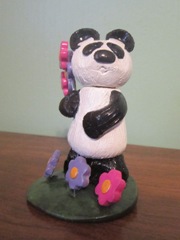 Panda in Flower Garden